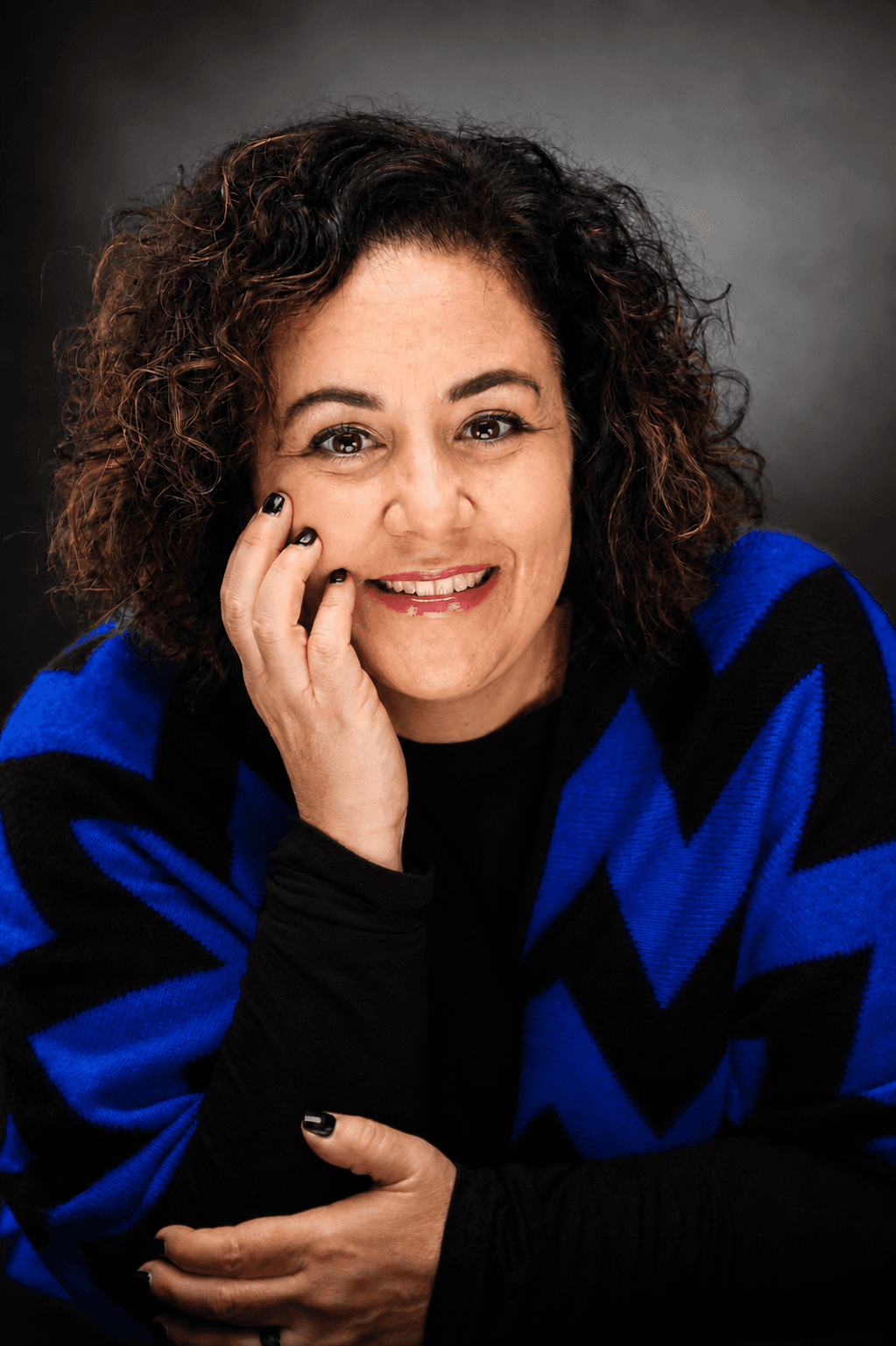 Portrait of Angela M. Riccelli, founder of Exit the Pattern